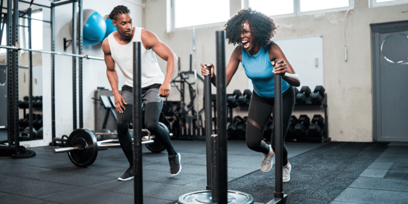 Employee training with coach—building strength and resilience to show how well-being fuels workplace performance.